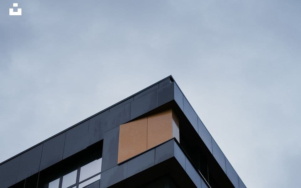 Architectural geometric facade of a modern corporate commercial building
