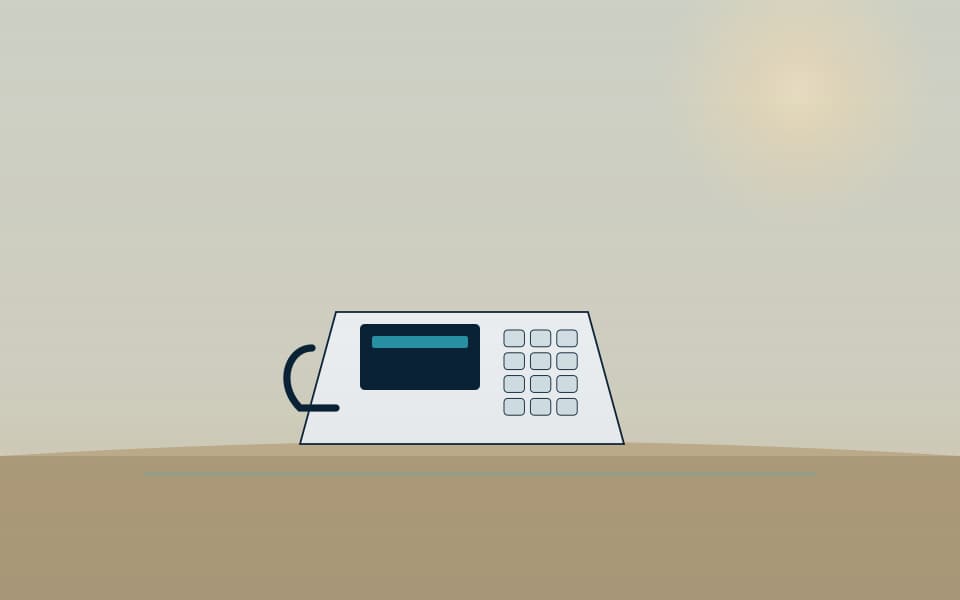 IP desk phone on a reception desk, in daylight