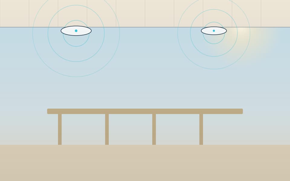 Ceiling Wi-Fi access points over a work area, in daylight