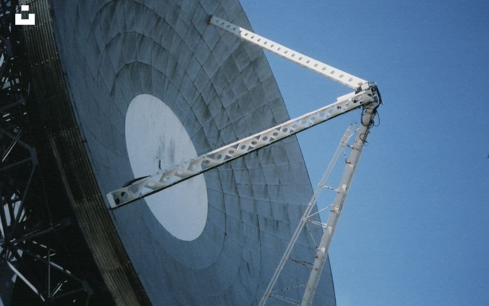 High-gain directional point-to-point wireless parabolic dish antenna on mounting bracket